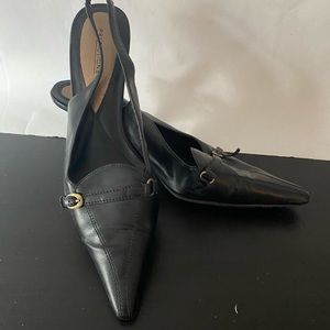 Predictions black leather mules. Size 8.5.